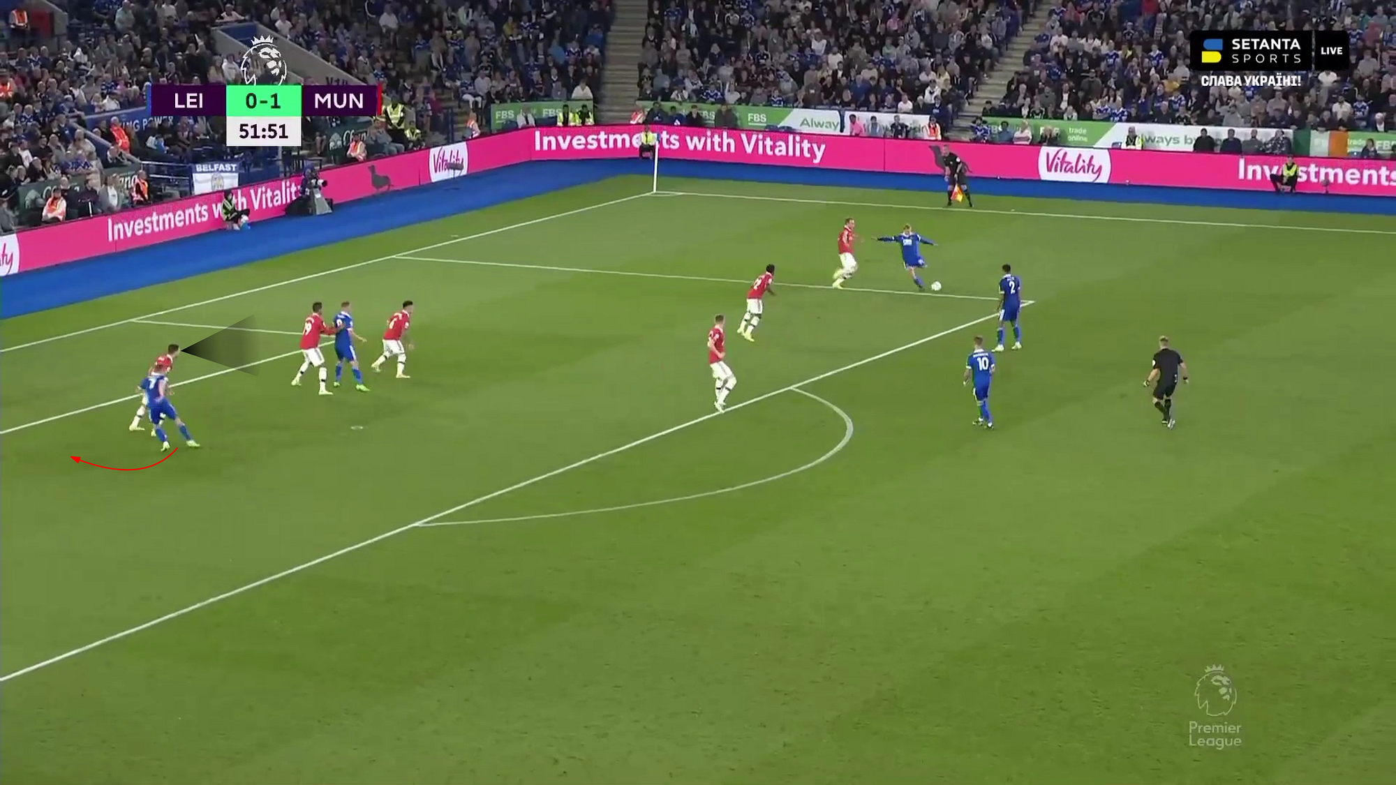 Dalot following the ball with a closed body, losing his man at the far post