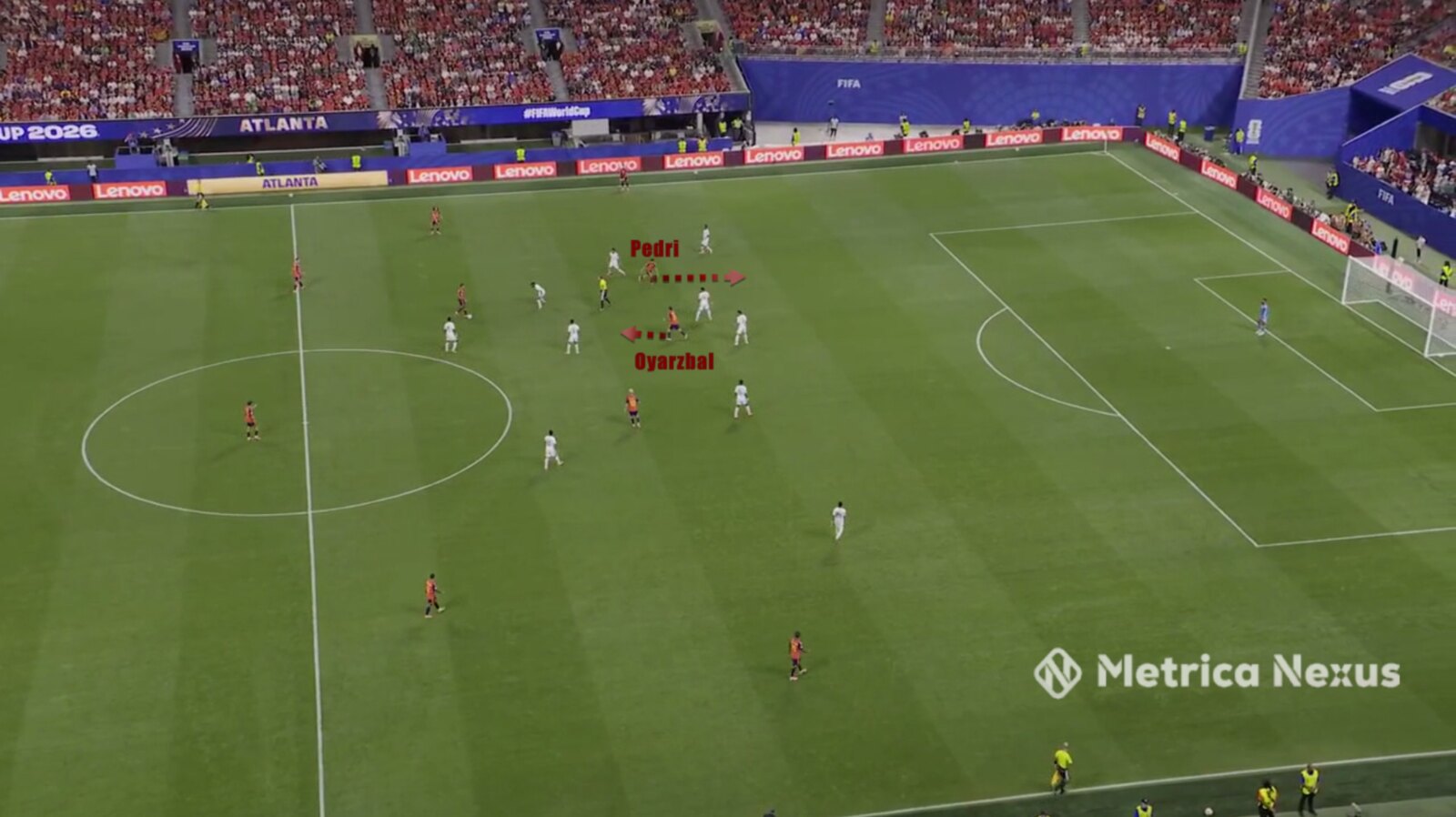 Rodri on the ball, Oyarzabal dropping, Pedri attacking space