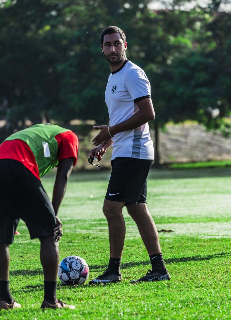 Coach running training session in Africa