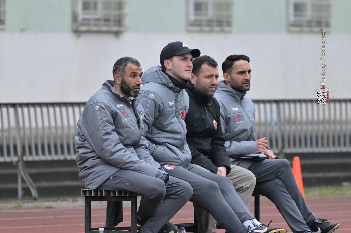 BAK coaching staff on bench during match